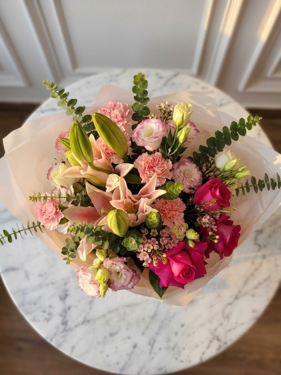 Rosé Reverie - side view of premium pink rose, lisianthus, carnation and lily bouquet by Mira Le Fleur